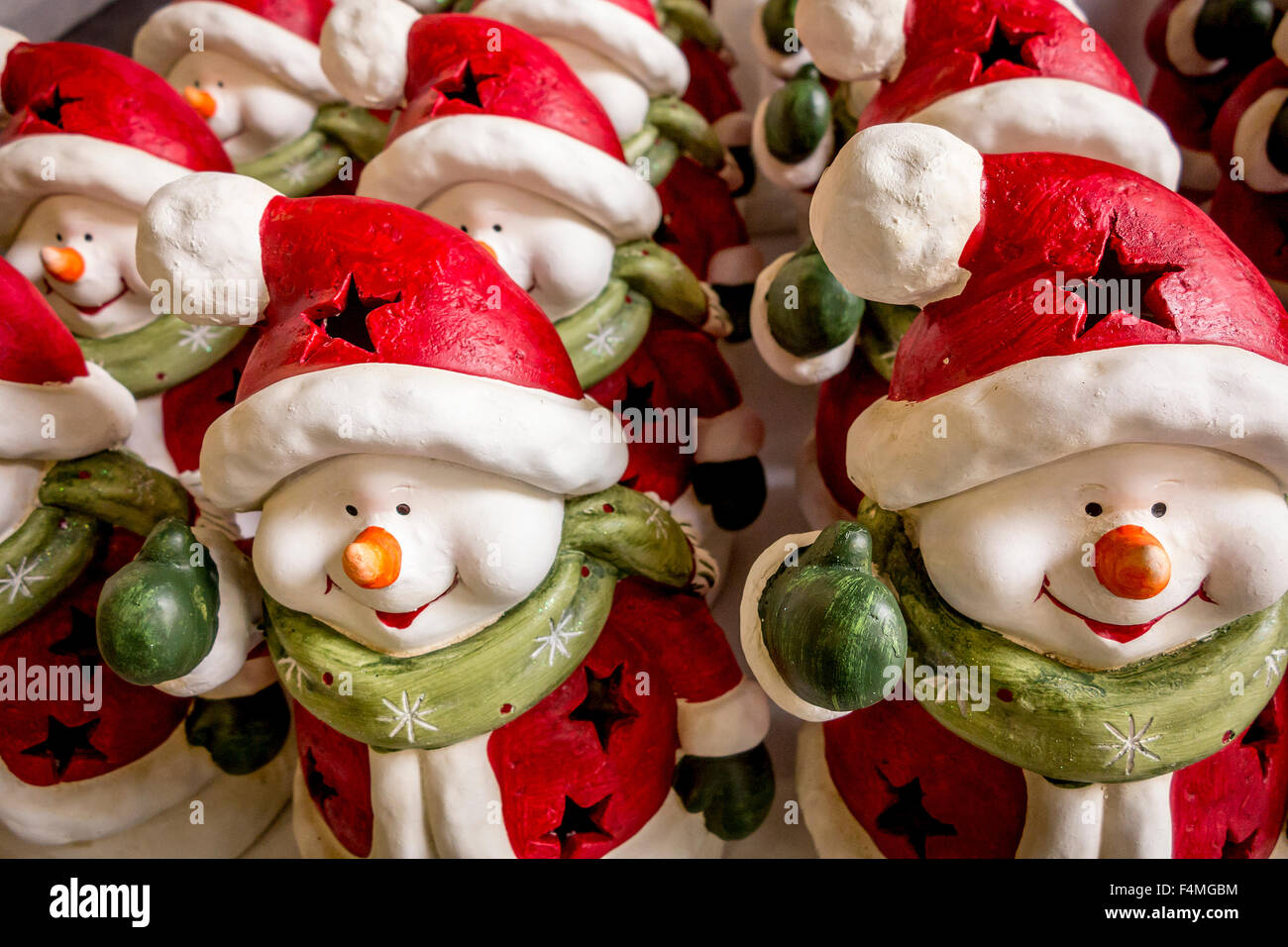 snowmen ornaments in father christmas outfits lined up for snowmen ornaments in father christmas outfits lined up for