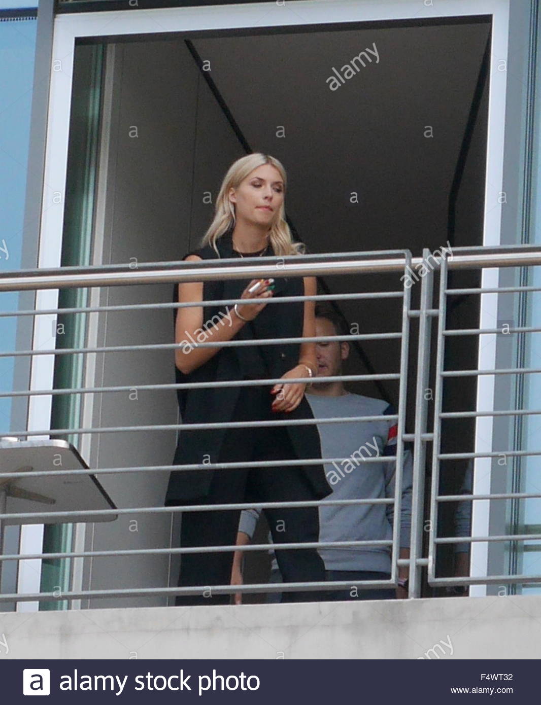 Lena Gercke smoking on the balcony of Sat1 studios Featuring Lena
