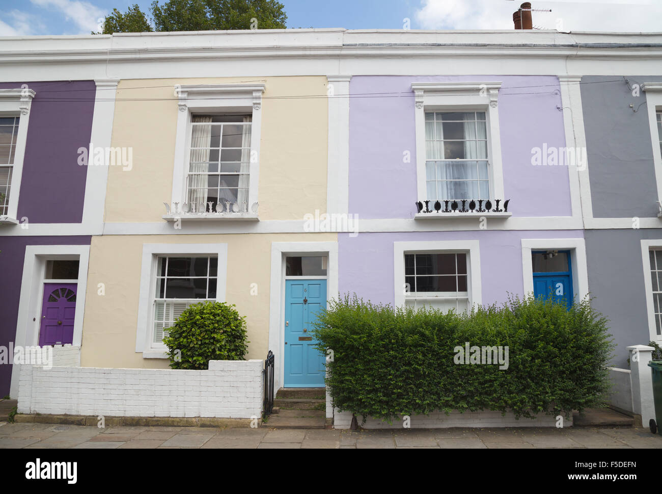 Colourfully painted terraced houses on Leverton Street, Kentish Town
