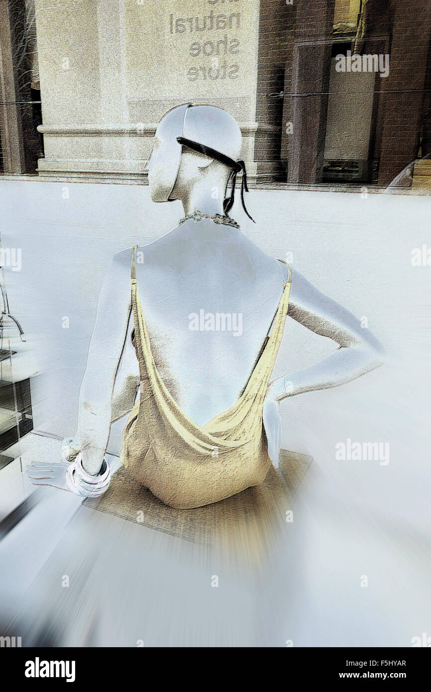 Dummy wearing a low-cut dress, displayed in a fashion shop, Covent ... Dummy wearing a low-cut dress, displayed in a fashion shop, Covent ...