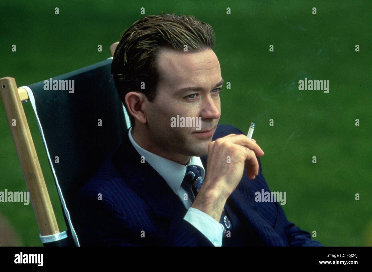 Timothy Hutton smoking a cigarette (or weed)
