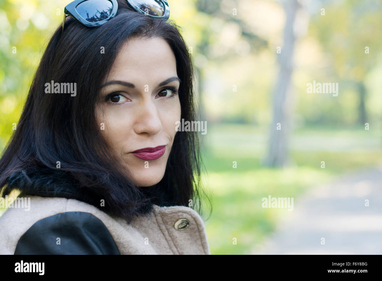 Beautiful And Attractive Black Haired Woman Posing For A Fashion Shoot