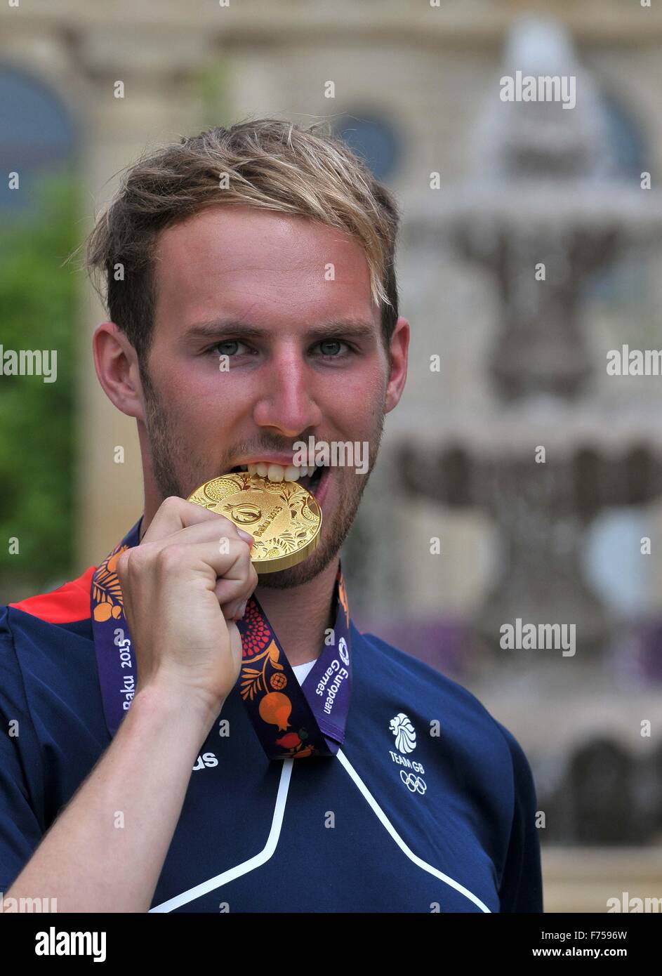 <b>Gordon Benson</b> (GBR) with his GOLD medal. Mens Triathlon. - gordon-benson-gbr-with-his-gold-medal-mens-triathlon-athletes-village-F7596W