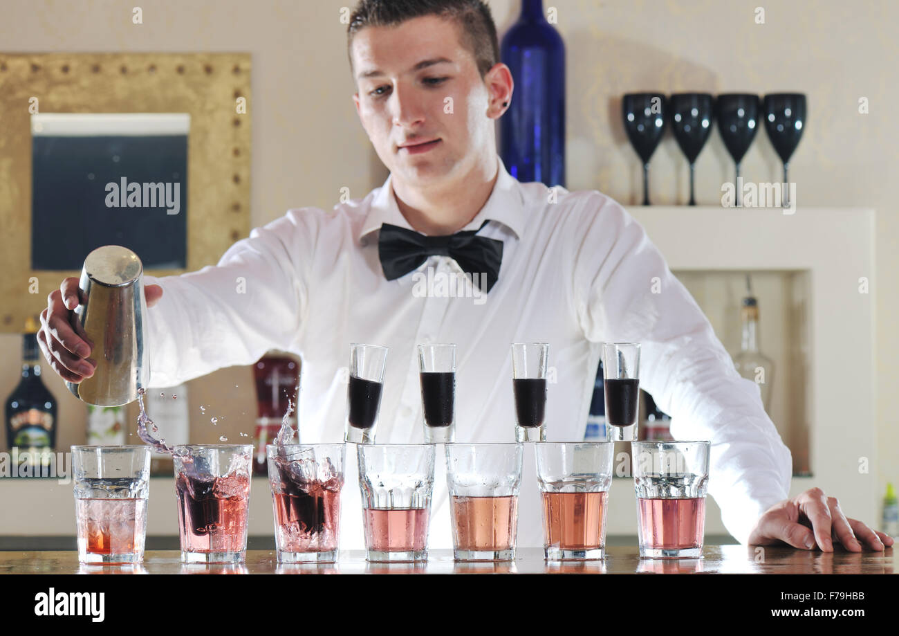 pro barman prepare coctail drink and representing nightlife and pro bartender