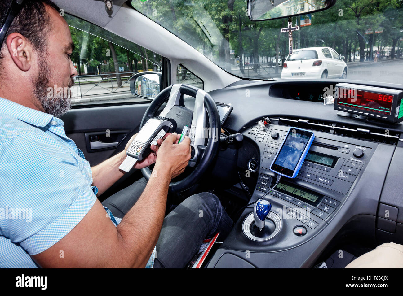 Spain Europe Spanish Hispanic Madrid Salamanca Calle de Goya taxi cab