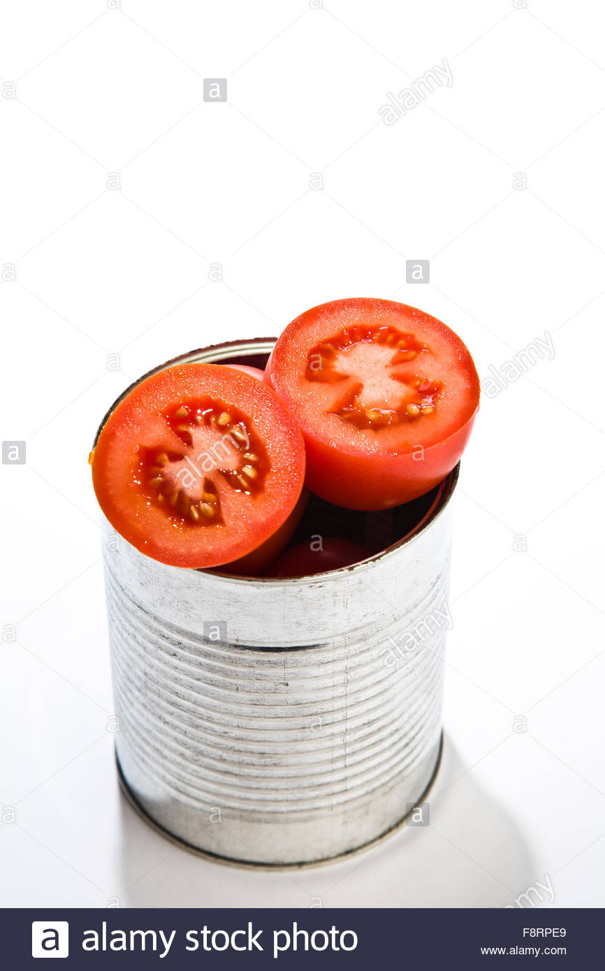 Cut Fresh tomatoes in a tin Stock Photo, Royalty Free Image: 91491633 ...