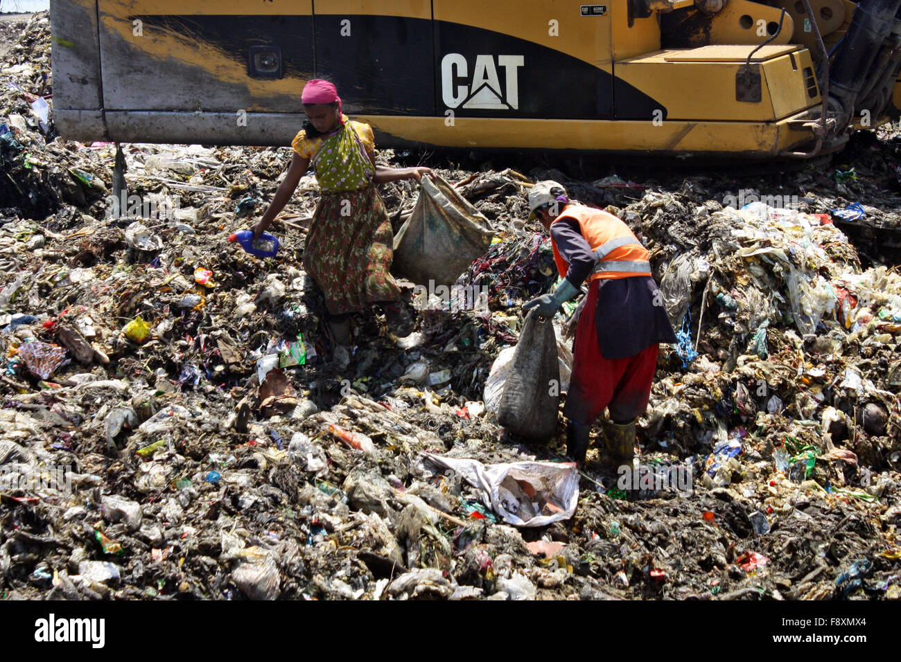 Child waste pickers pick the non biodegradable waste to be used for