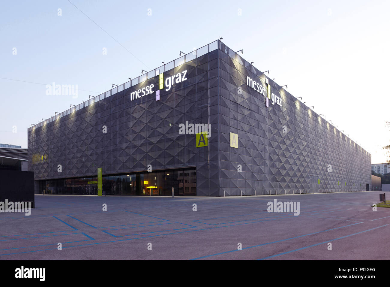 exterior view of the modern architecture of the messe graz exhibition hall messe graz sign in white hanging against the slate - Modern Architecture Exhibition exterior view of the modern architecture of the messe graz exhibition hall messe graz sign in white hanging against the slate - Modern Architecture Exhibition