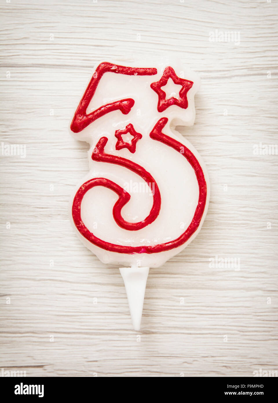 Birthday Candle Number 3 On The Wooden Background Stock