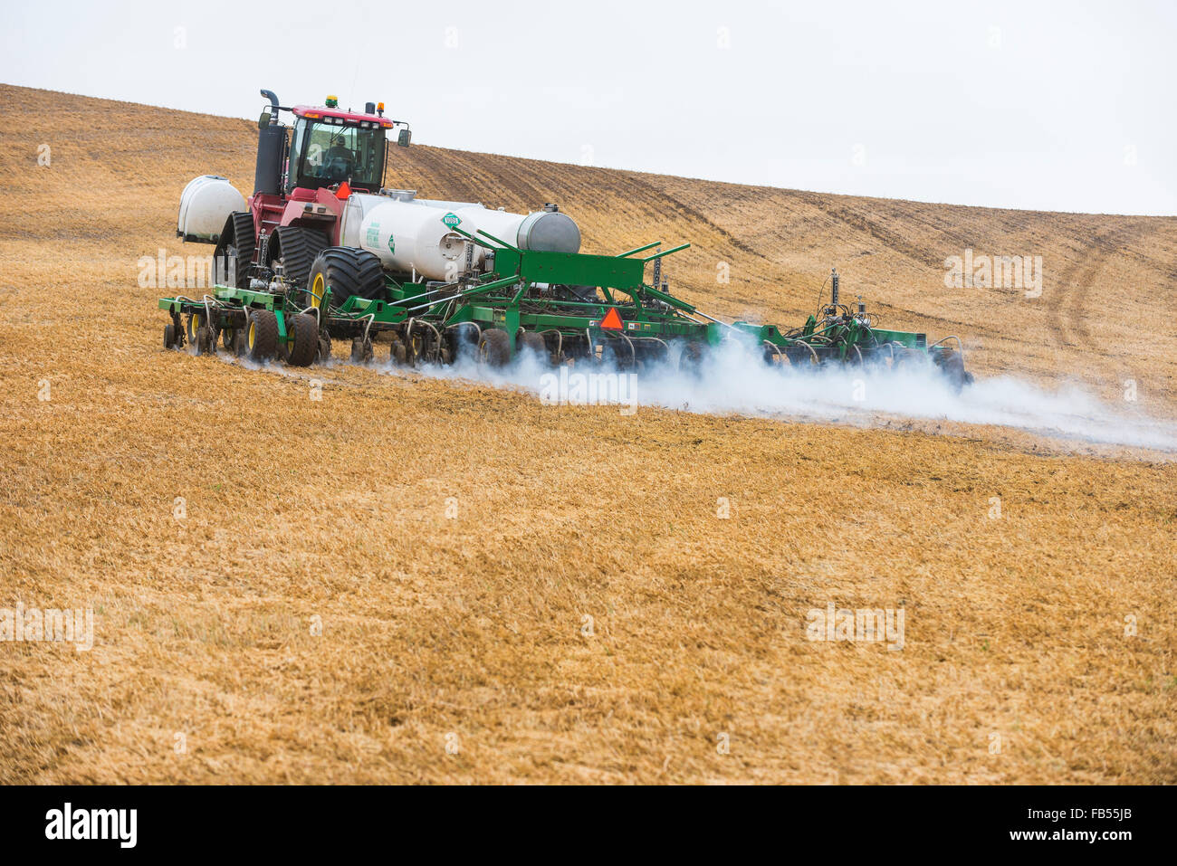 Case Quadtrac Tractor Pulling An Anhydrous Ammonia Tank And Applicator