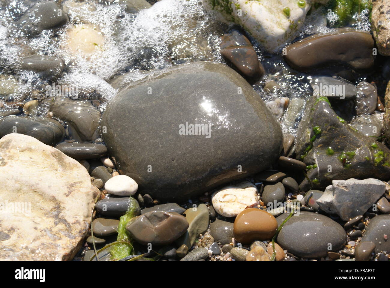 Stone Texture Background Sea Stones Under Sunshine With Sea Waves And