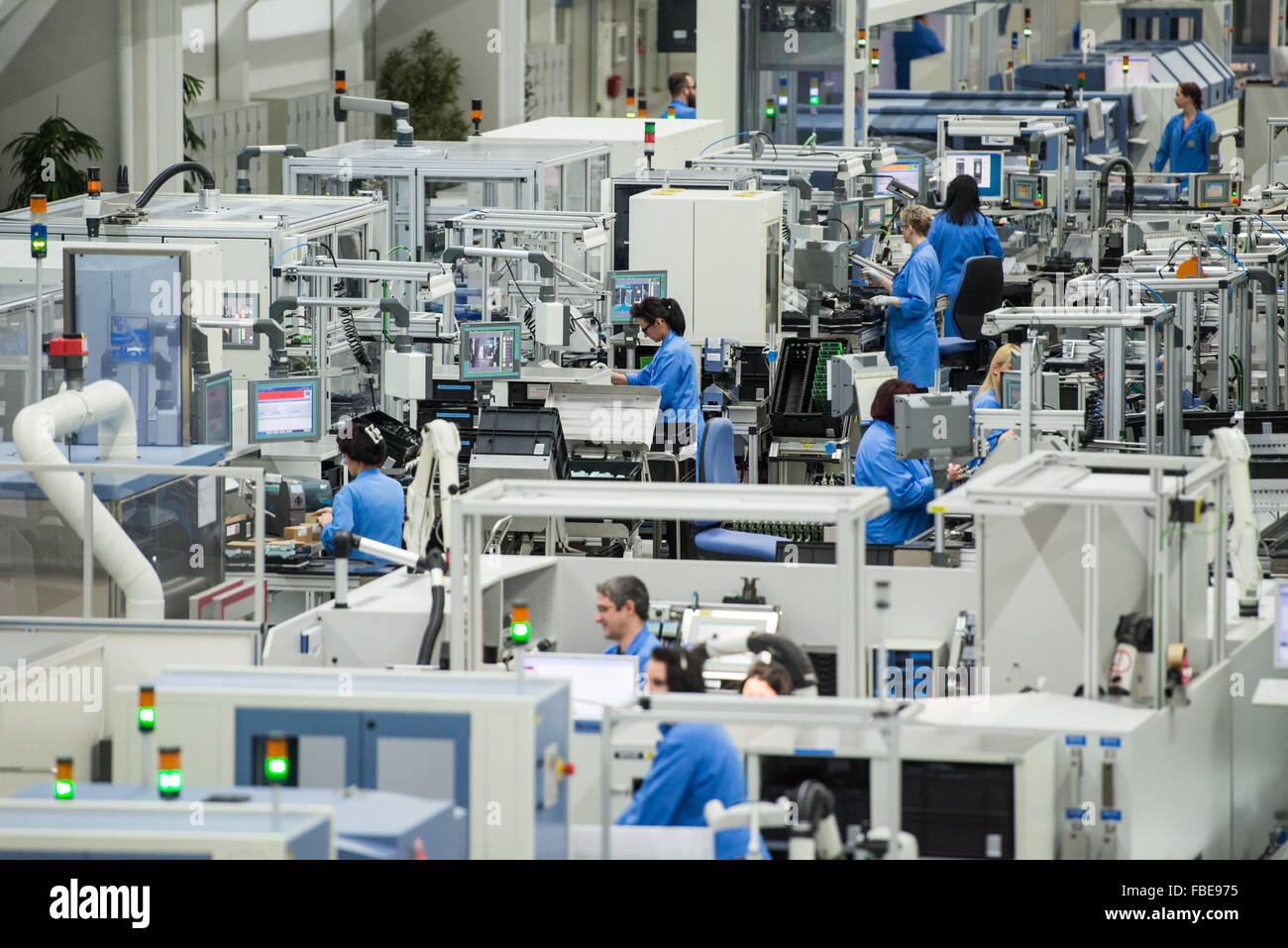 Employees are busy working on the production lines at the production
