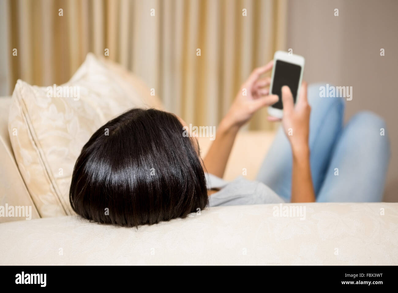 Brunette Using Smartphone Stock Photo Alamy