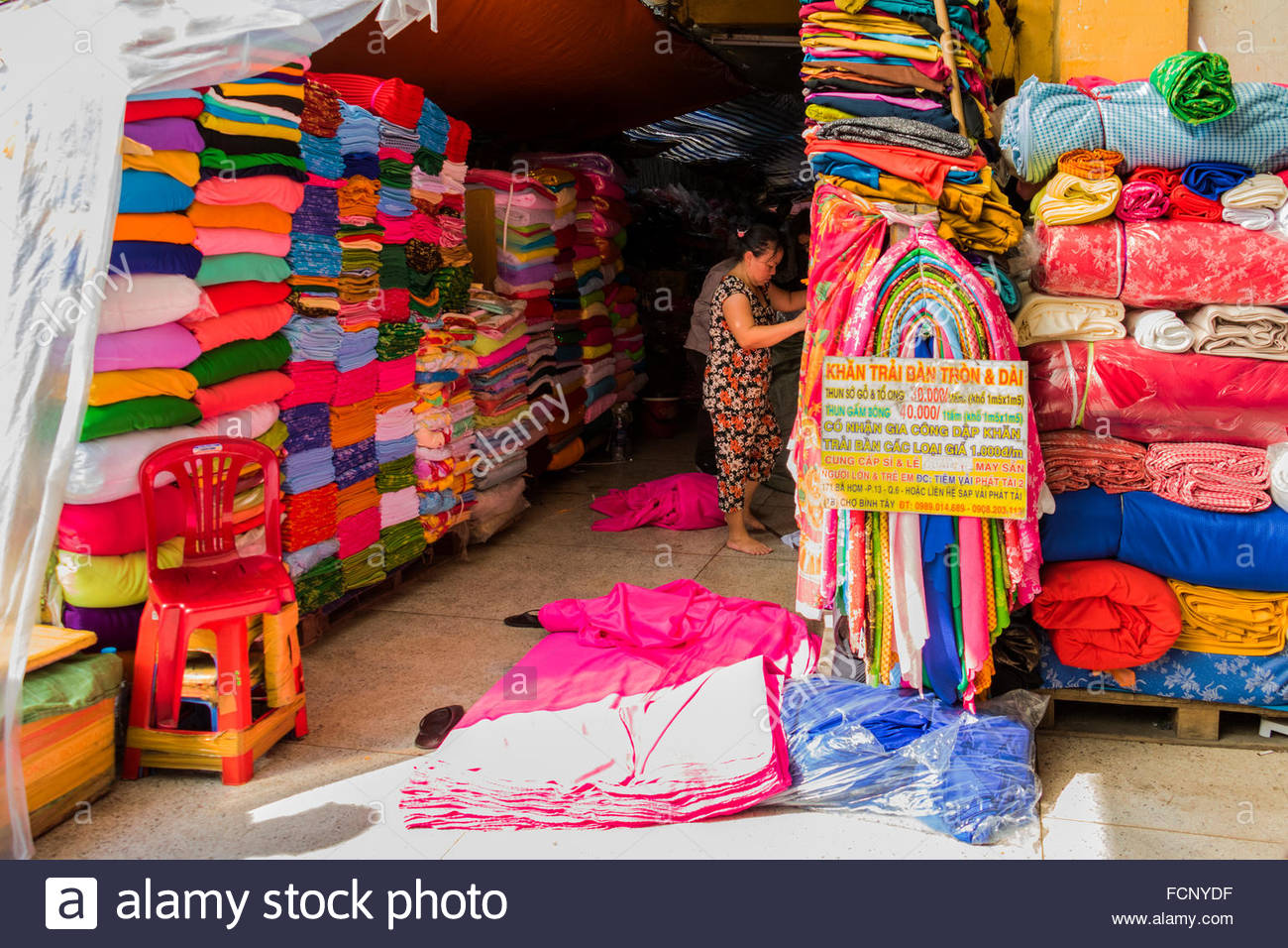 Trader in cloth in Chinatown District 5 Ho Chi Minh city Vietnam Stock