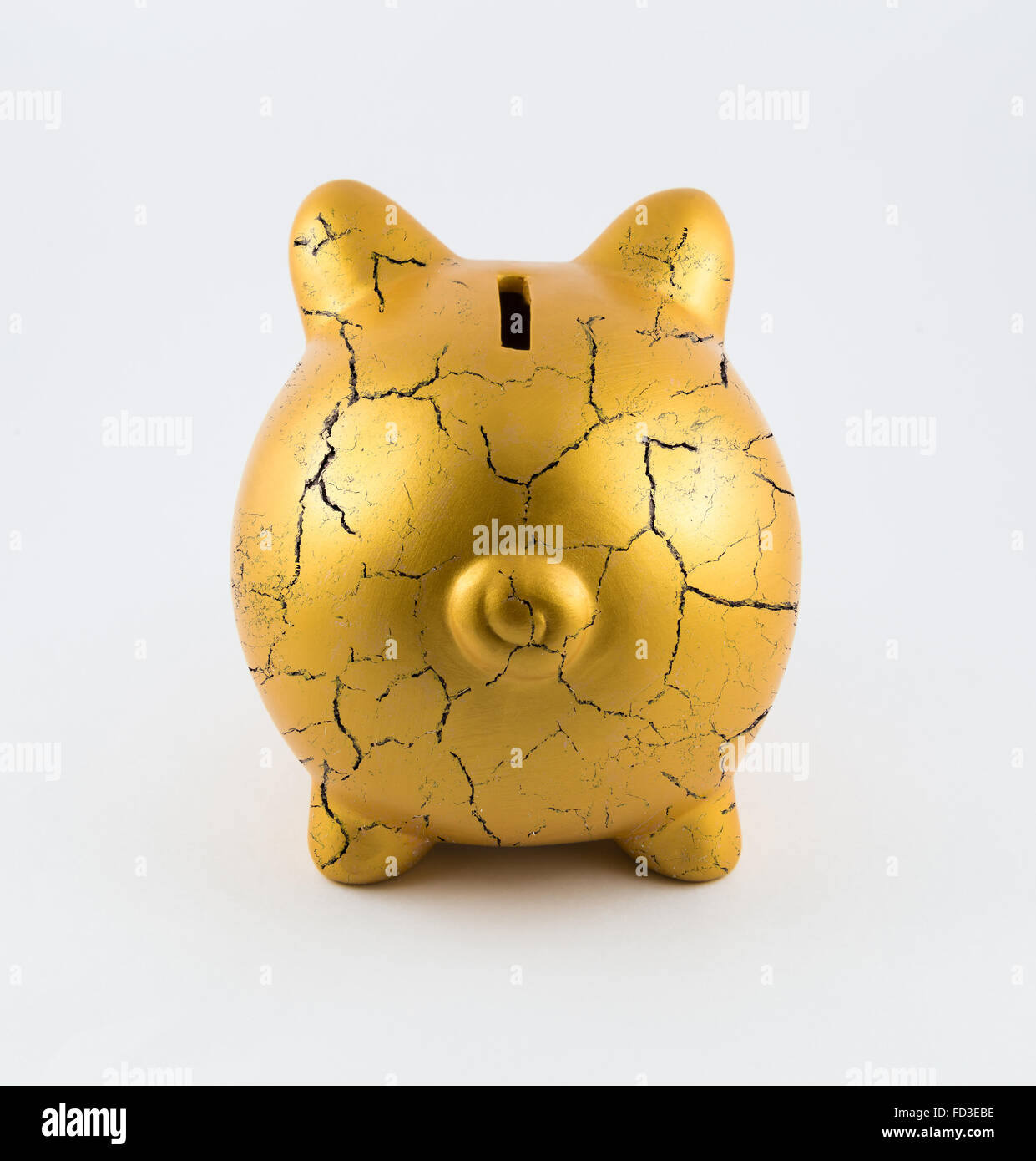 Back Side Of Gold Piggy Bank Cracked On Isolated White Background - Back Side Of Gold Piggy Bank Cracked On Isolated White Background back side of gold piggy bank cracked on isolated white background - back side of gold piggy bank cracked on isolated white background