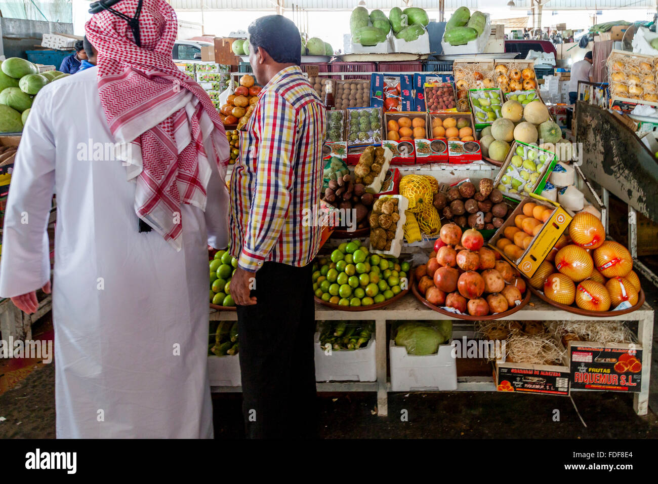 A Local Qatari Man Shopping In The Municipal Market, Doha, Qatar Stock