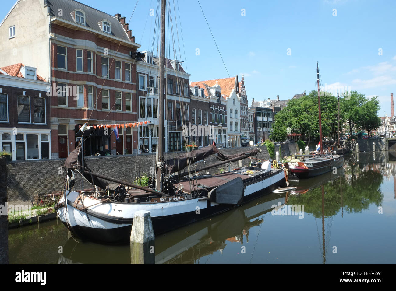 Wooden Dutch Sailing Barges In The Harbour At Delfshaven, Rotterdam