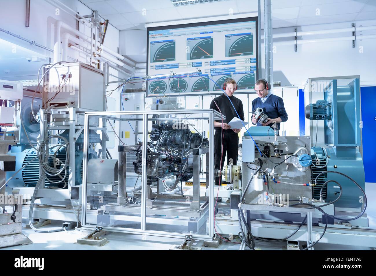 Scientists in turbo charger automotive research laboratory Stock Photo