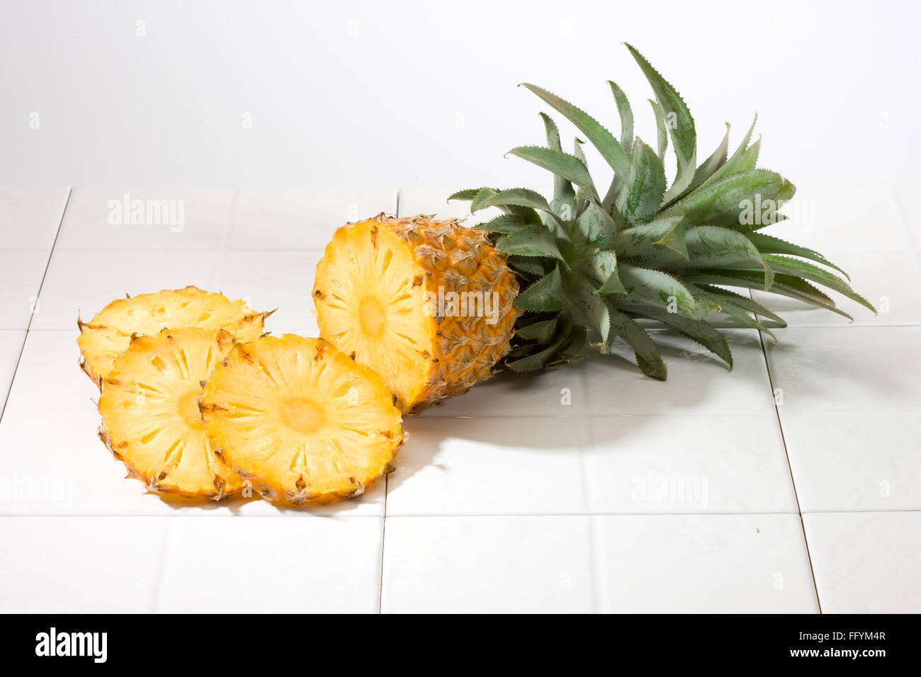 Pineapple With Pineapple Slice Stock Photo Alamy