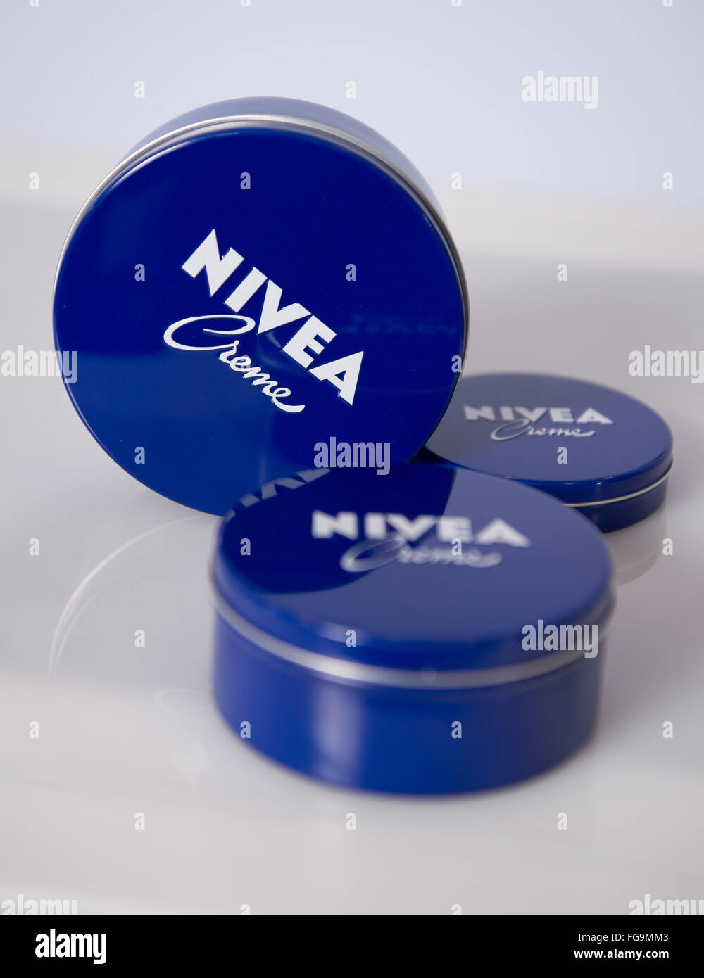 Stock Photo - Blue cans of 'Nivea-Creme' lotion of Beiersdorf AG are on display on a table at the headquarter of German personal care company 'Beiersdorf AG' in Hamburg, Germany, 17 February