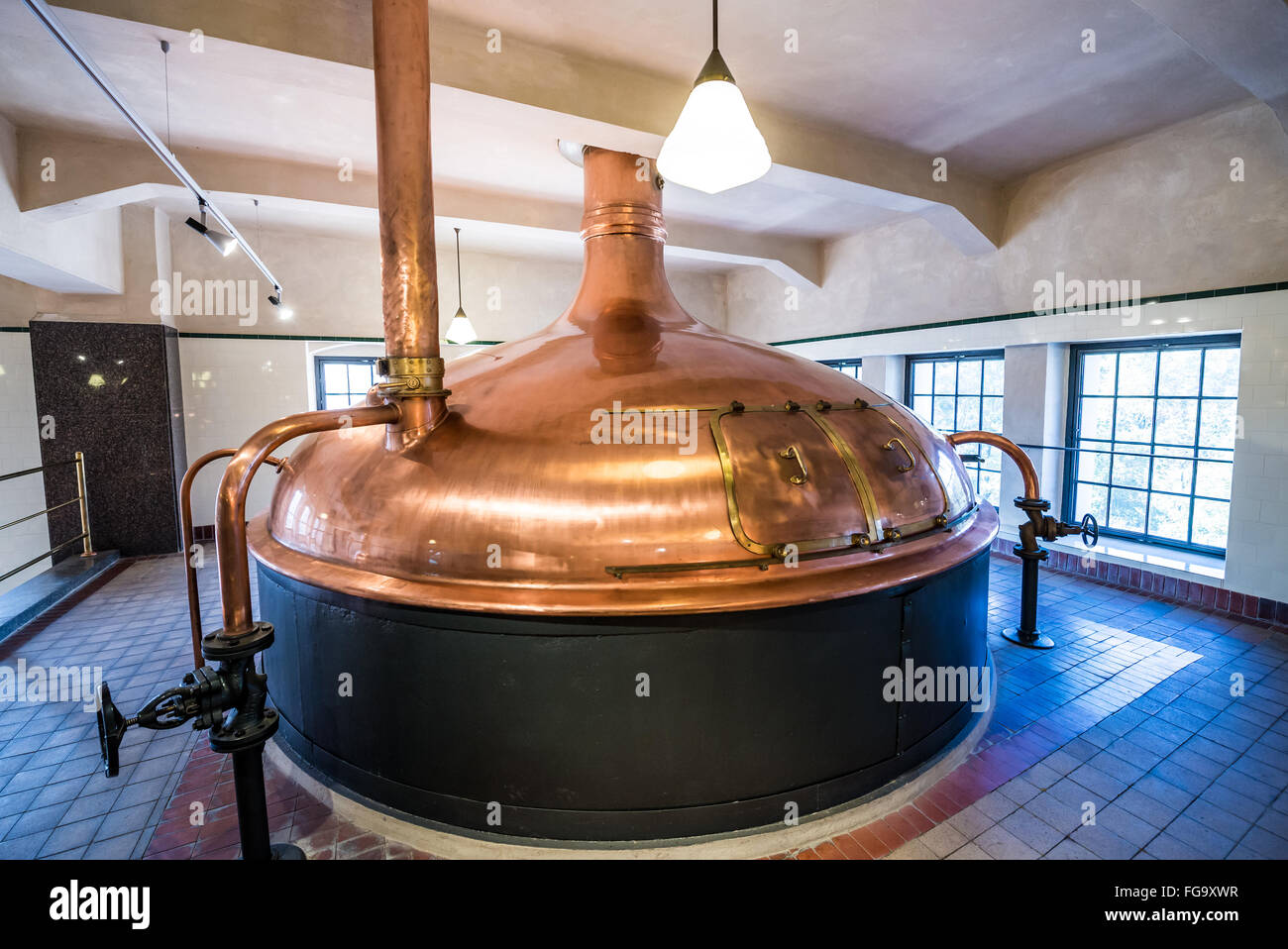 Copper brewing tank inside the modern brewery Stock Photo, Royalty Free