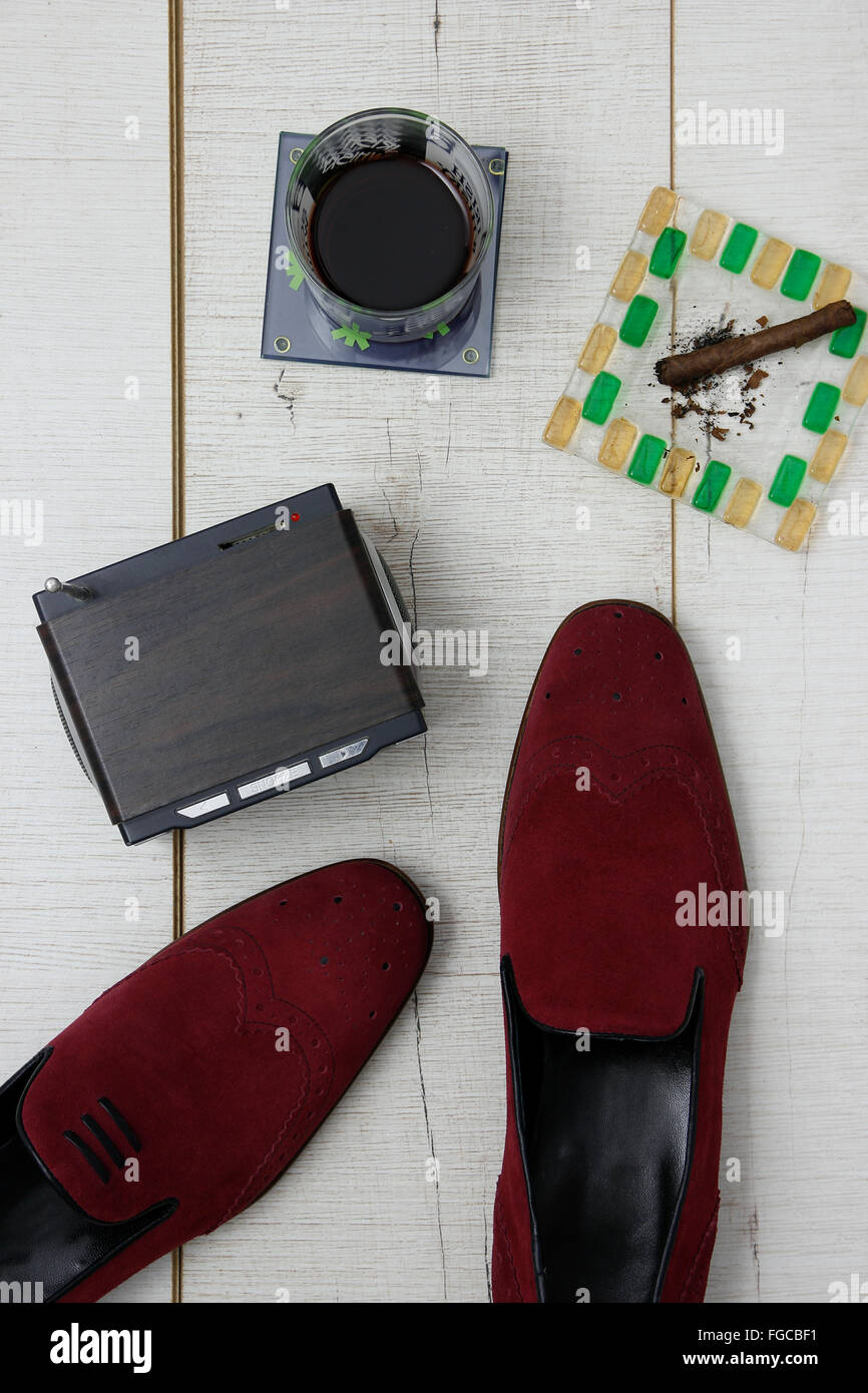 Mens Leather Shoes Sitting On A Wooden Background Stock Photo