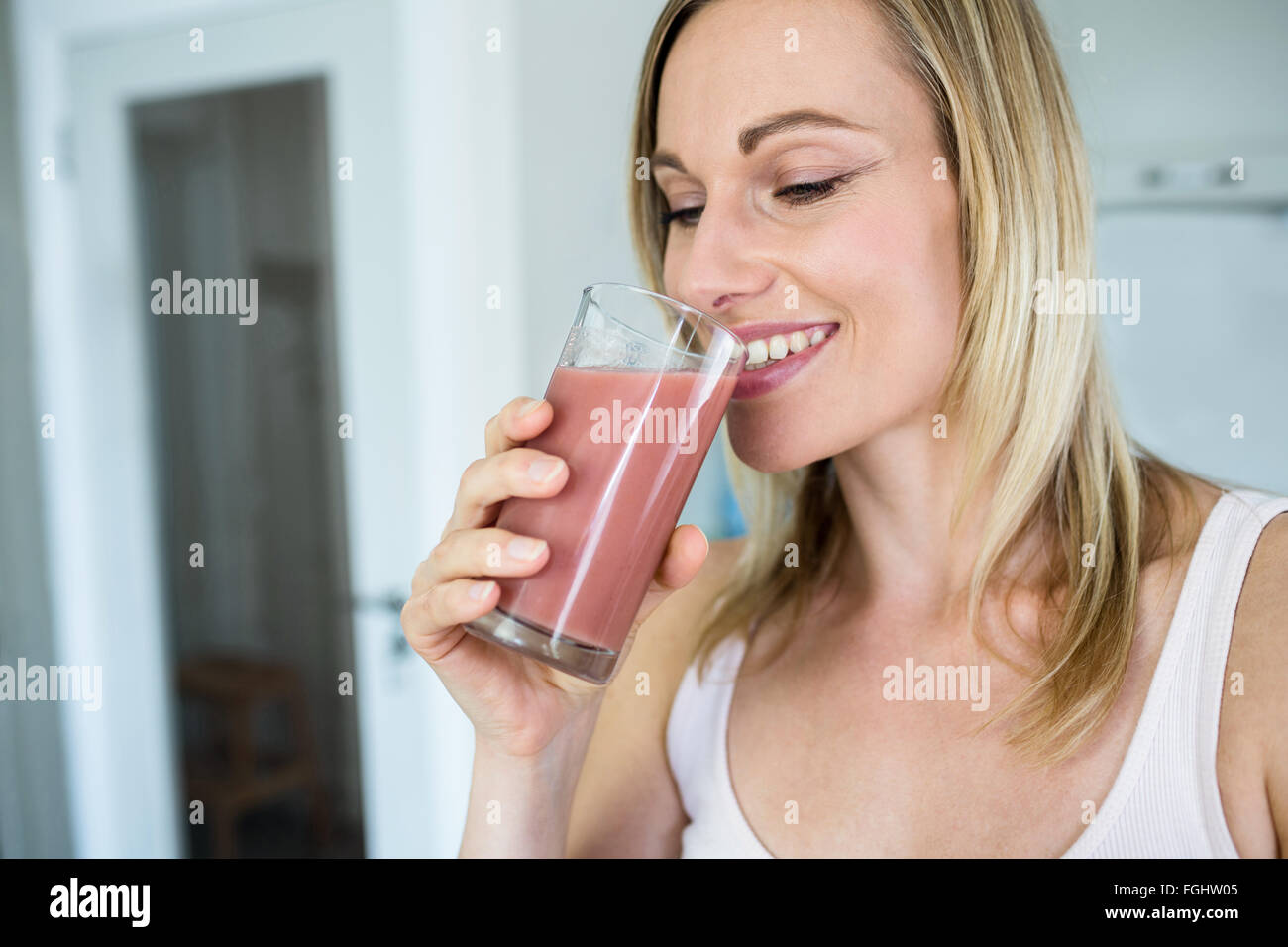 Pretty Blonde Woman Holding Her Homemade Smoothie Stock Photo Alamy