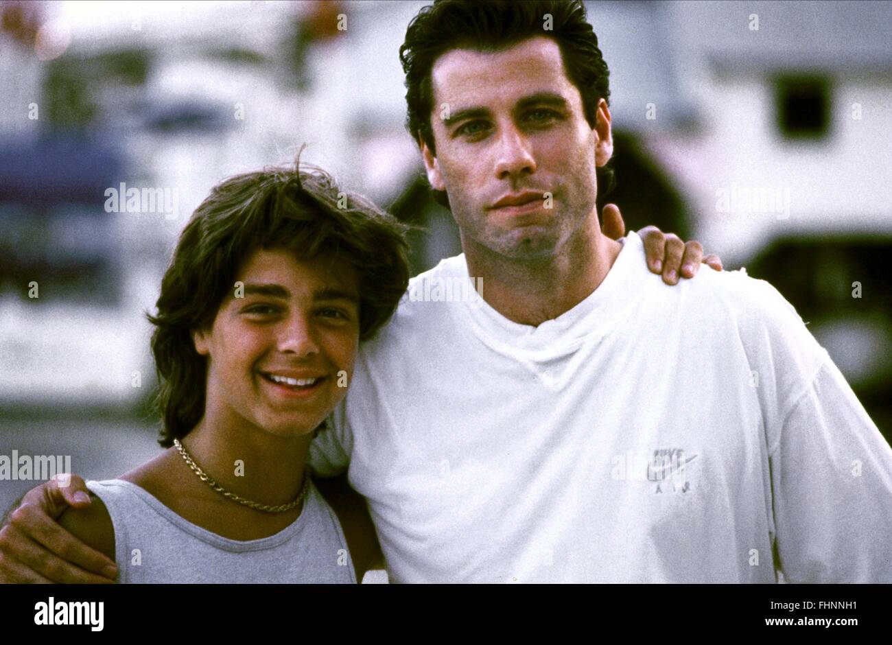 JOEY LAWRENCE & JOHN TRAVOLTA CHAINS OF GOLD (1991 Stock Photo, Royalty