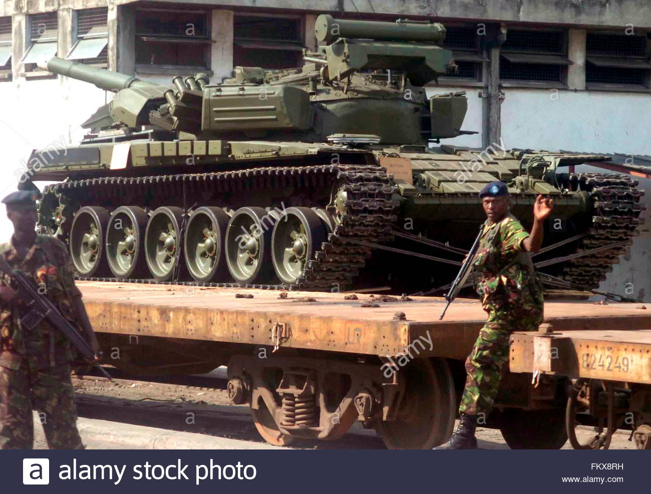 epa01638725-one-of-the-33-soviet-era-t-72-tanks-is-offloaded-from-FKX8RH.jpg