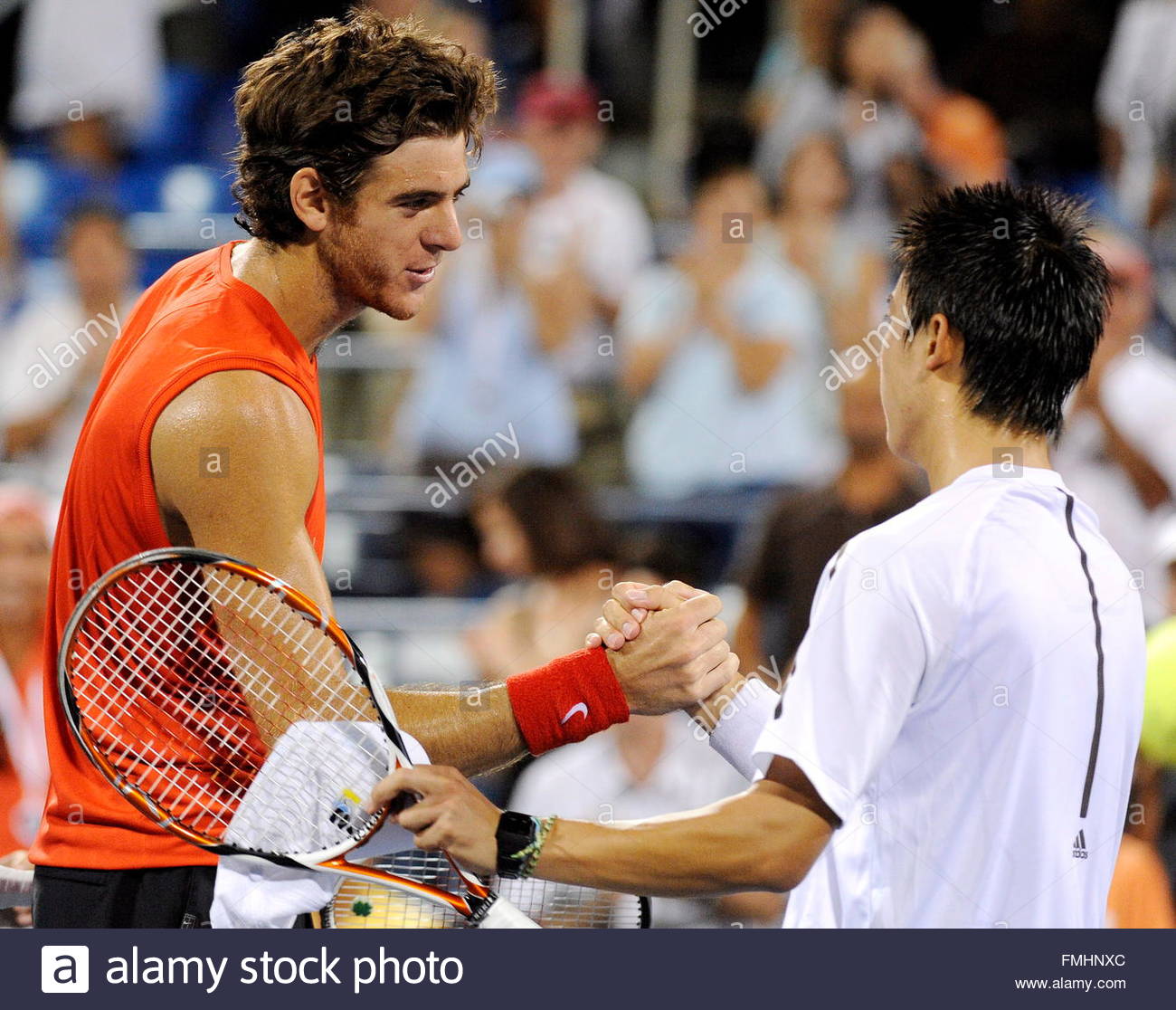 juan-martin-del-potro-l-of-argentina-shakes-hands-with-kei-nishikori-FMHNXC.jpg
