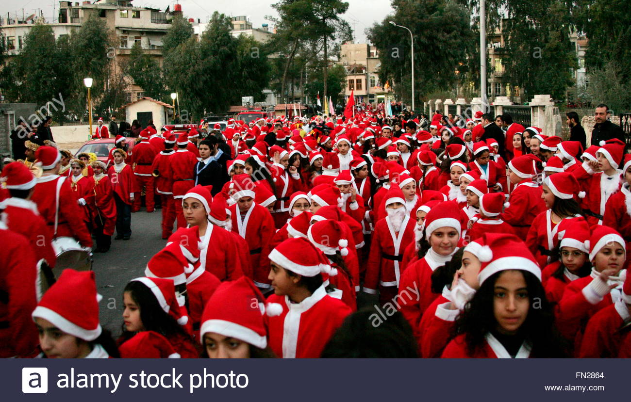 young-syrians-wear-santa-claus-costumes-during-christmas-celebrations-FN2864.jpg