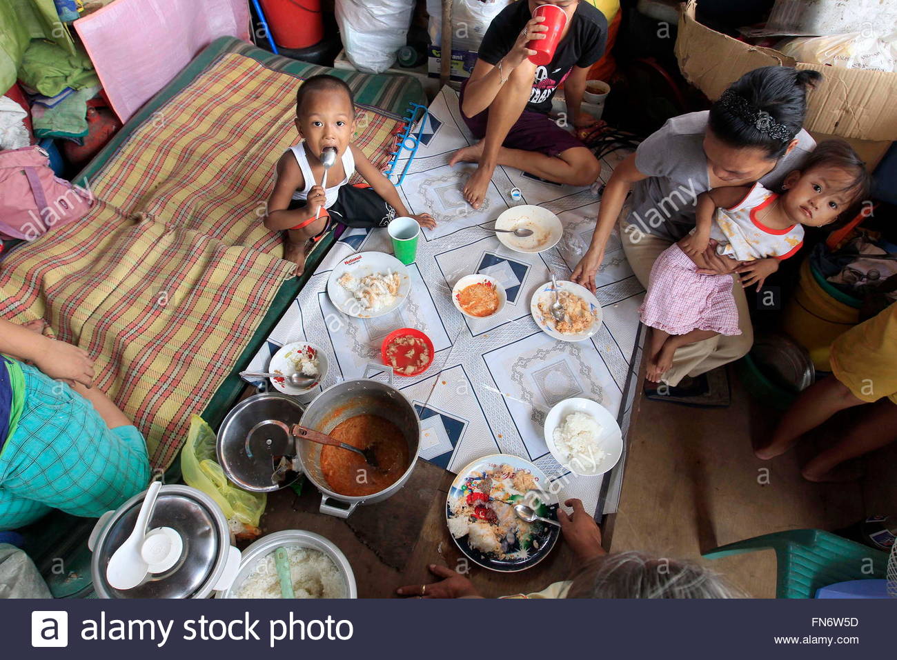 The informal settlers in the philippines: their problems and solutions essay image