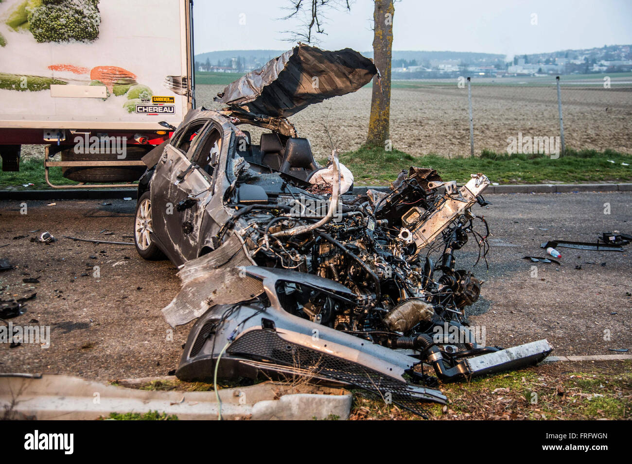 A car is completely destroyed after an accident which left