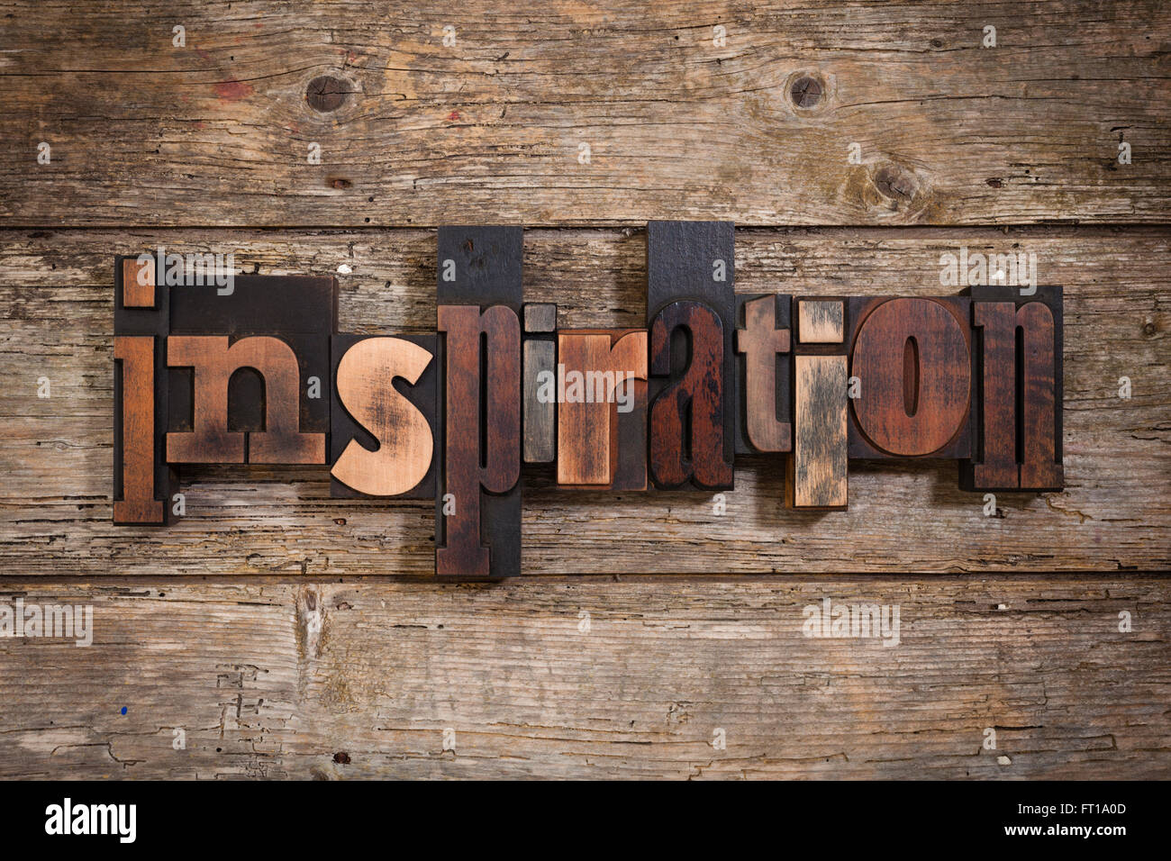 Inspiration Word Written With Vintage Letterpress Printing Blocks On Rustic Wooden Background Inspiration Word Written With Vintage Letterpress Printing Blocks On Rustic Wooden Background