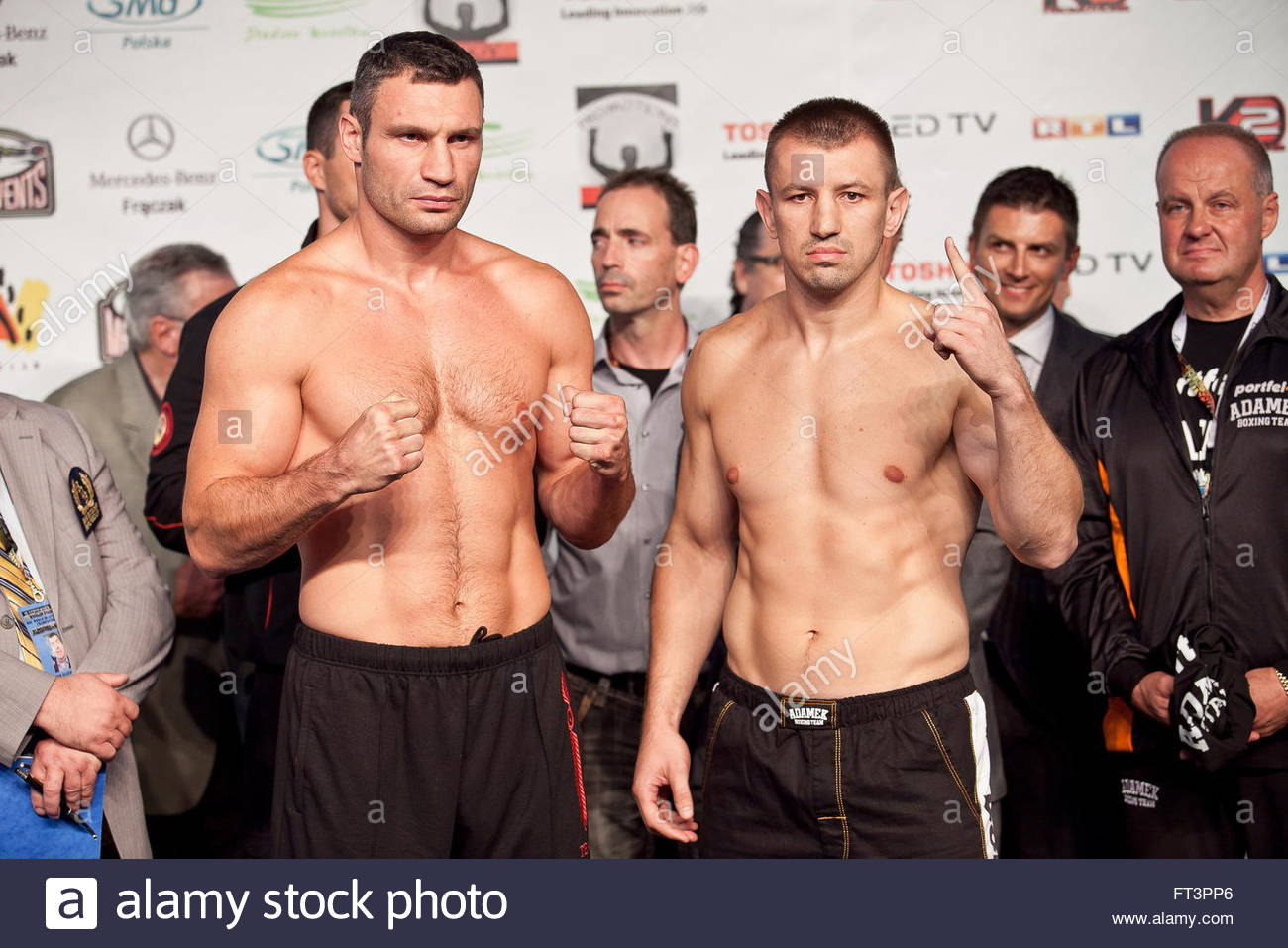 ukraines-vitali-klitschko-l-and-polands-tomasz-adamek-r-pose-for-photographers-FT3PP6.jpg