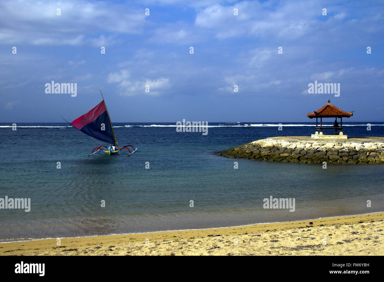 Jukung Traditional Balinese Fishing Boat Sailing Off The Beach Sanur