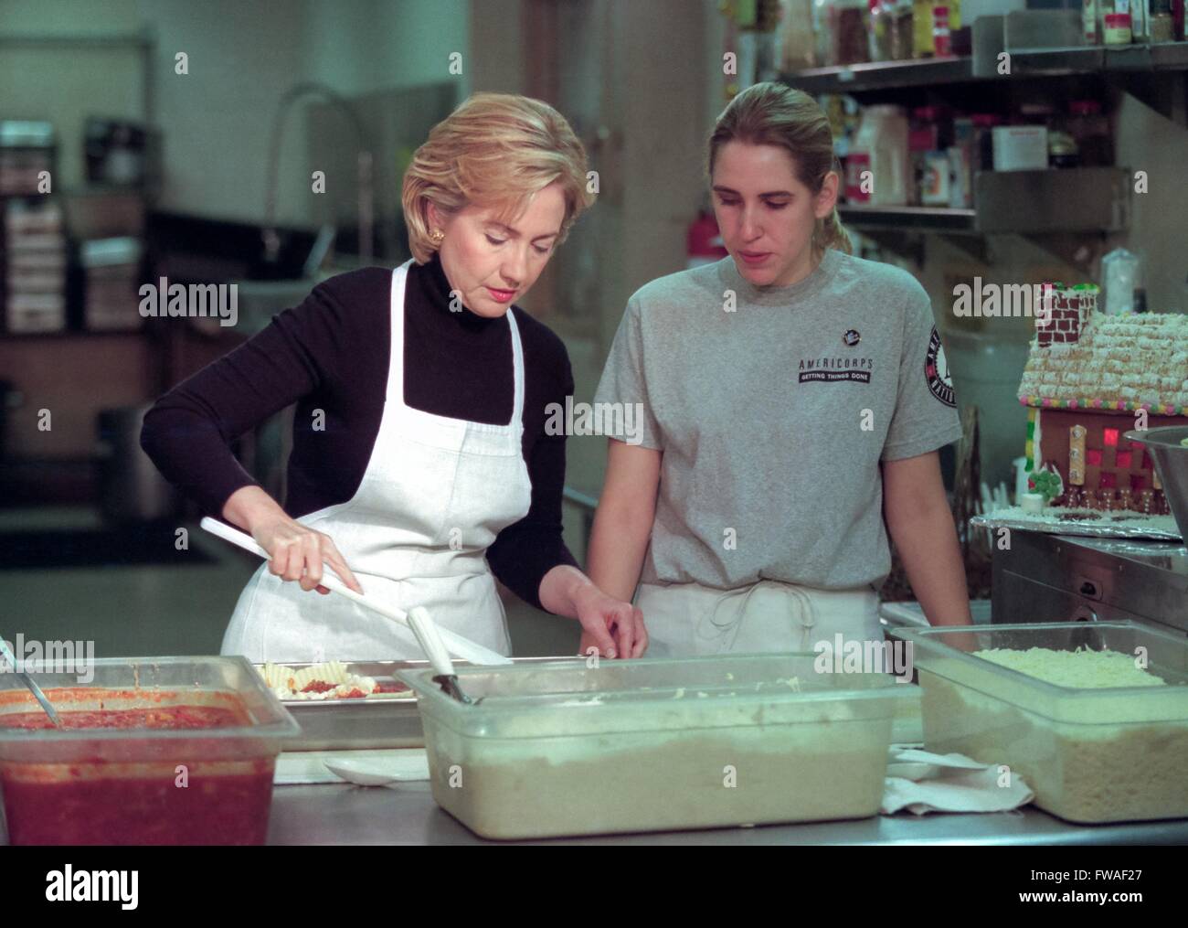 US First Lady Hillary Rodham Clinton Helps Prepare Lasagna At