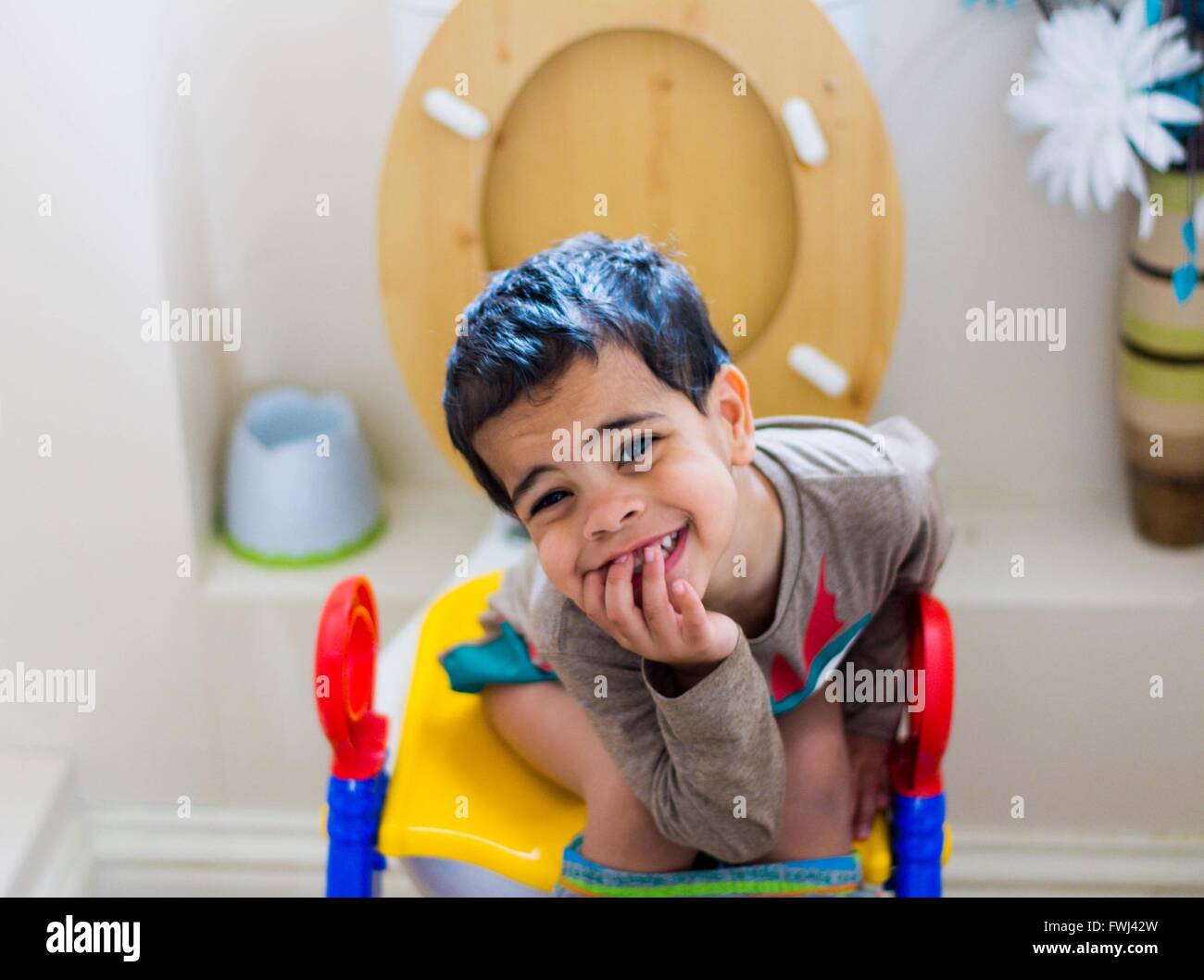 Boy Sitting On Toilet Stock Photo, Royalty Free Image 101816593 Alamy