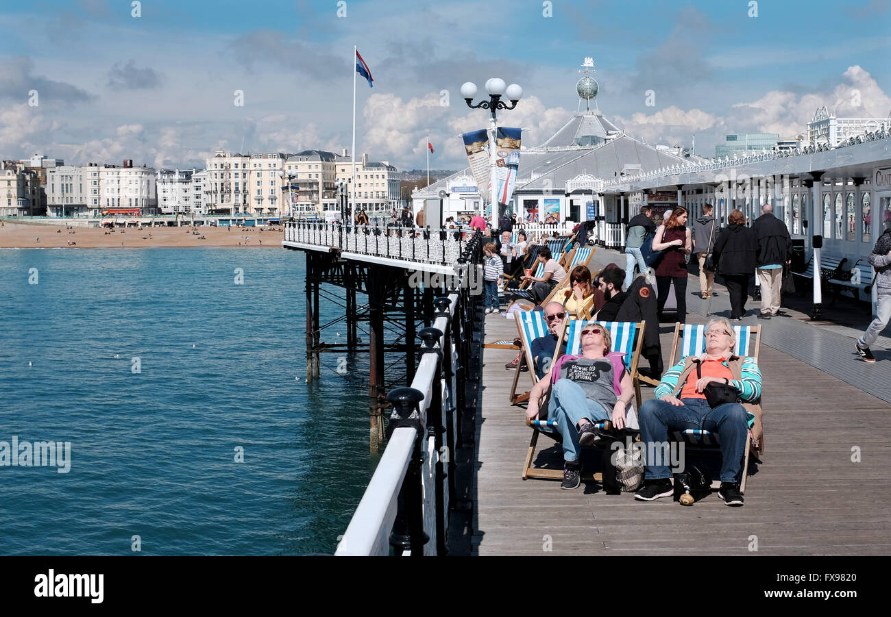 Brighton, UK. 12th April, 2016. UK Weather Visitors enjoy the warm