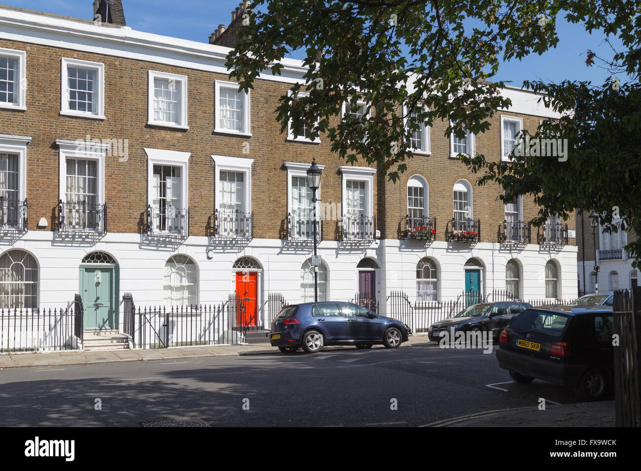 era terraced homes on Gibson Square, Islington, London N1