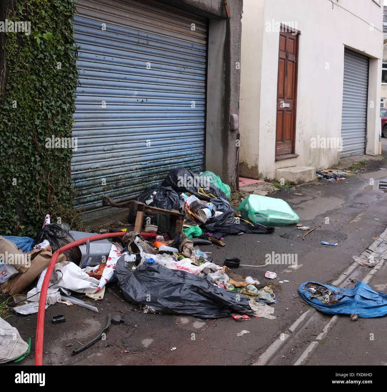 Rubbish and garbage left in a Cardiff back street, local authority do