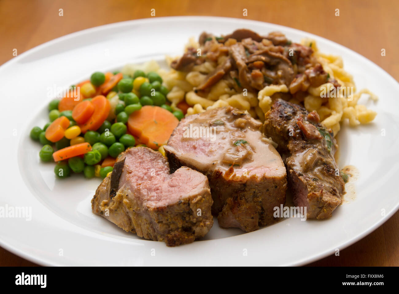 Pork Tenderloin With Spaetzle And Vegetable Stock Photo Alamy