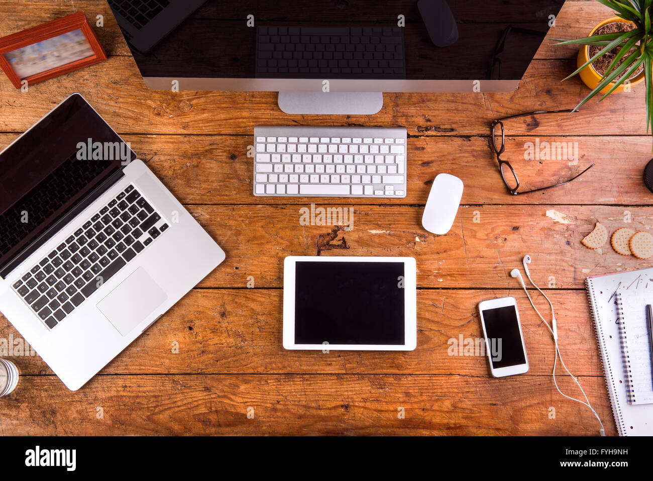 desk, gadgets and office supplies. flat lay. wooden background desk, gadgets and office supplies. flat lay. wooden background