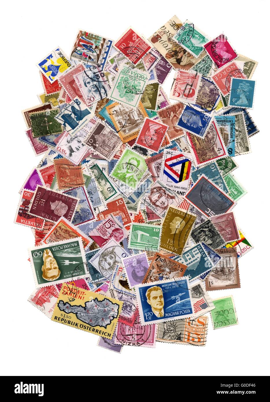 Hundreds Of Postage Stamps From Many Different Countries Stock Photo