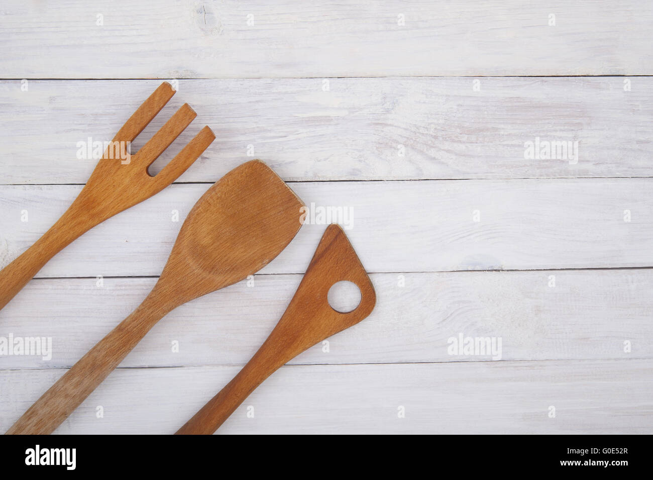 Wooden Kitchen Utensils On A Background Of White Boards Stock