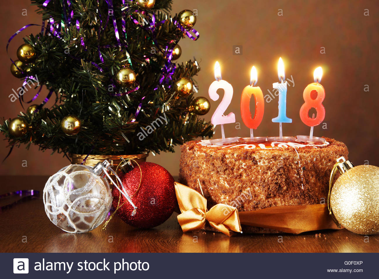 new year 2018 still life chocolate cake and artificial new year 2018 still life chocolate cake and artificial