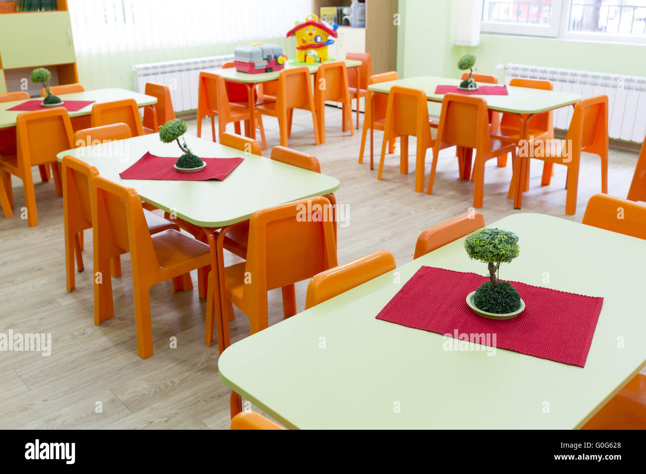 Kindergarten Classroom With Small Chairs And Tables Stock Photo
