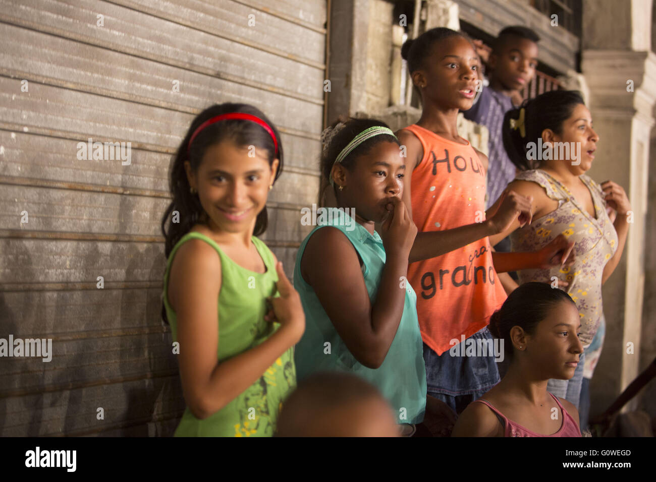 Havana, Cuba, Cuba. 3rd May, 2016. Amazed Cuban girls watching the Stock Photo, Royalty Free