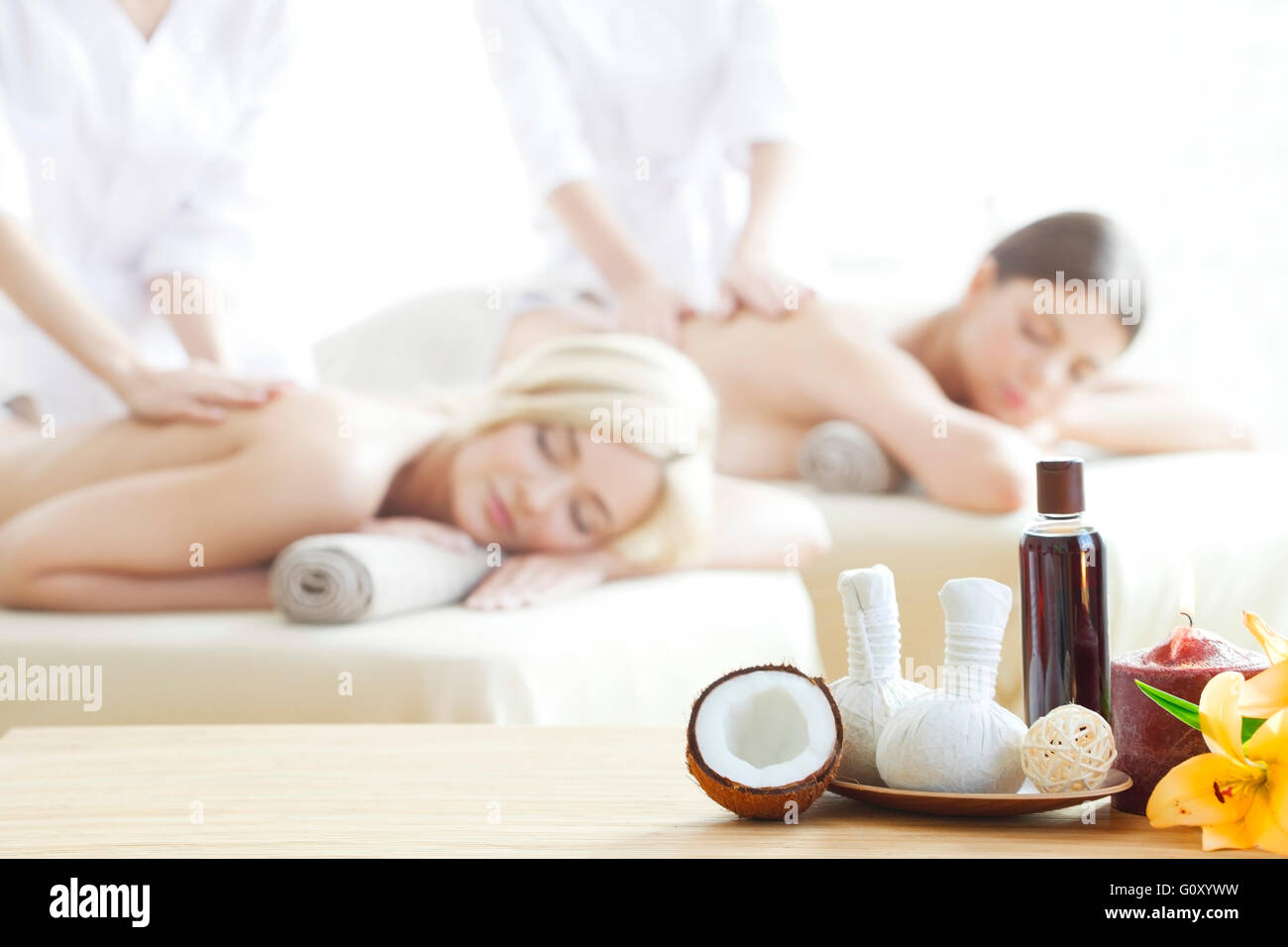 Spa Massage Tools And Women Getting Massage On Background Stock