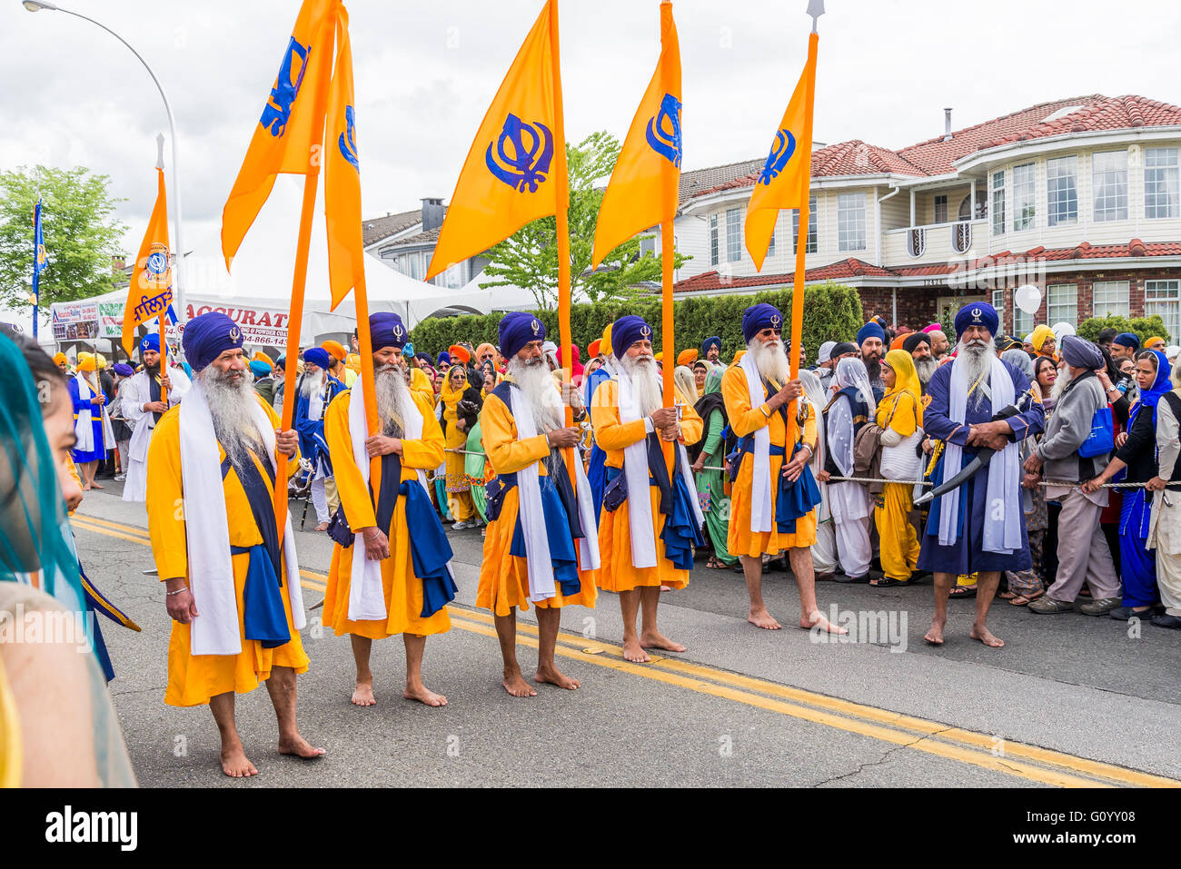 Vaisakhi celebration Sikh Khalsa flag bearers, Surrey, British Stock